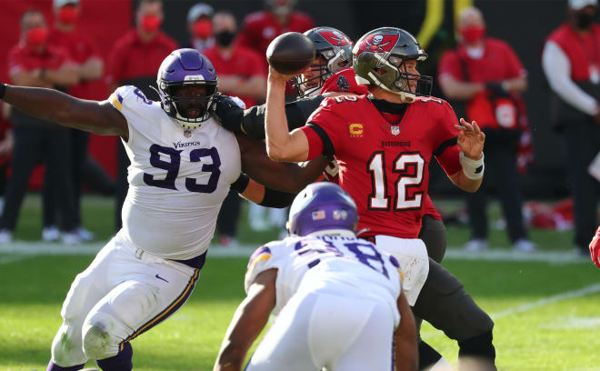 Former Michigan Wolverines football QB Tom Brady had a solid game for the  Buccaneers, tossing two TDs and no picks.