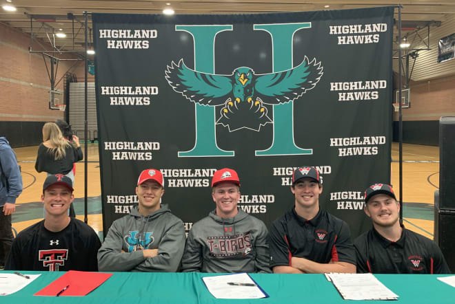 Highland football players (from left to right) Austin McNamara, Kyle Hester, Kohner Cullimore, Cooper Holman, and Griffin Nielson are all smiles after signing their letters of intent in the school's gymnasium in Gilbert last Wednesday.  The seniors finished their high school careers with an 11-2 season and pushed eventual 6A champion Chandler to overtime before losing by one point.  (Photo Courtesy of Highland Hawks Football Twitter account)