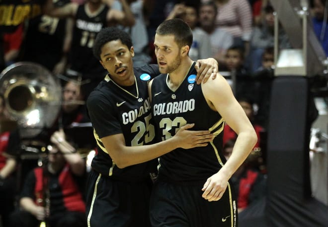 Austin DuFault and Spencer Dinwiddie embrace after a play during Colorado's NCAA Tournament matchup with UNLV on march 15, 2012. The Buffaloes won, 68-64, and DuFault scored 14 points.