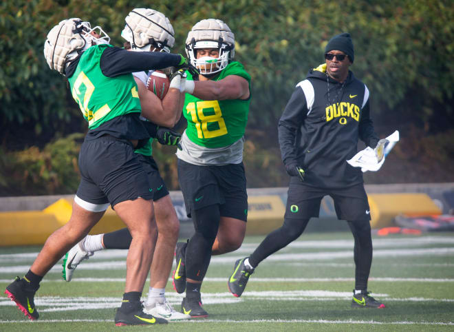 New co-defensive coordinator and safeties coach Chris Hampton engaged in practice earlier this week.