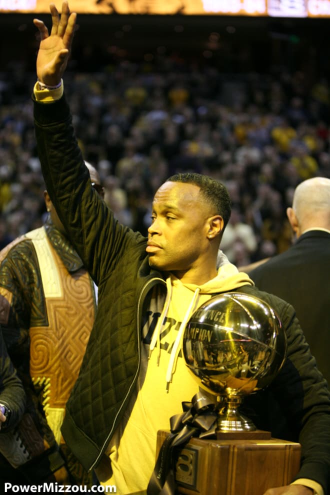Former Missouri guard Melvin Booker, pictured with the 1994 Big Eight trophy 25 years later, led the 1994 Tiger squad by scoring more than 18 points per game.