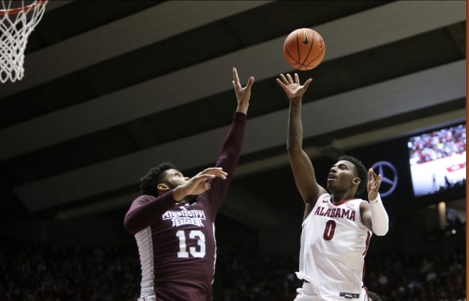  Mississippi State forward Will McNair Jr. (13) defends a shot by Alabama guard Jaden Bradley (0) at Coleman Coliseum. Photo | Gary Cosby Jr.-Tuscaloosa News / USA TODAY NETWORK