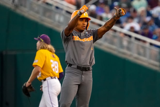 Jun 20, 2023; Omaha, NE, USA; Tennessee Volunteers second baseman Christian Moore (1) holds his thumbs up after hitting a double against the LSU Tigers during the eighth inning at Charles Schwab Field Omaha.