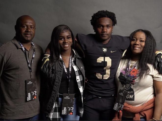 Young with his dad, sister and mom during visit to Army West Point