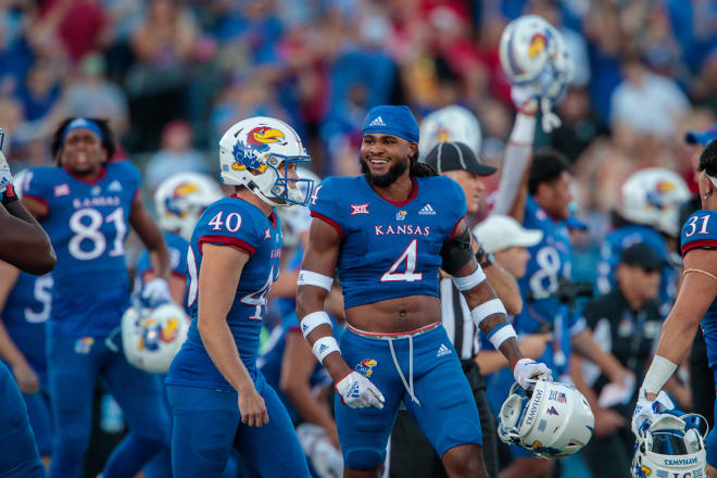 Kansas Jayhawks safety Marvin Grant (4) celebrates after the game against the Iowa State Cyclones at David Booth Kansas Memorial Stadium. Mandatory Credit: William Purnell-USA TODAY Sports