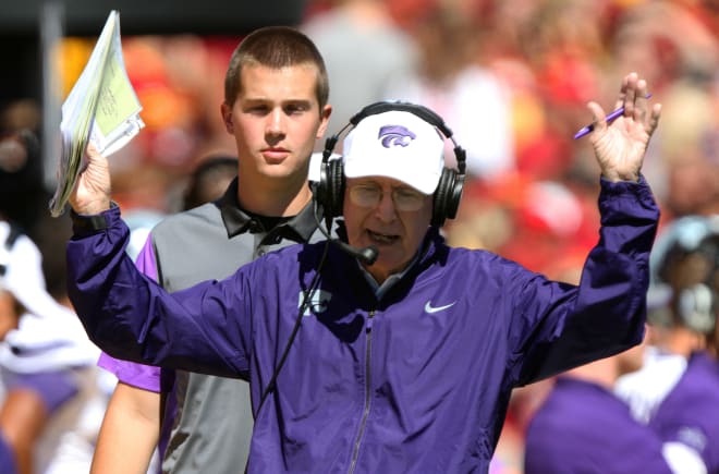 Bill Snyder throws his hands in the air during the 2014 Iowa State game