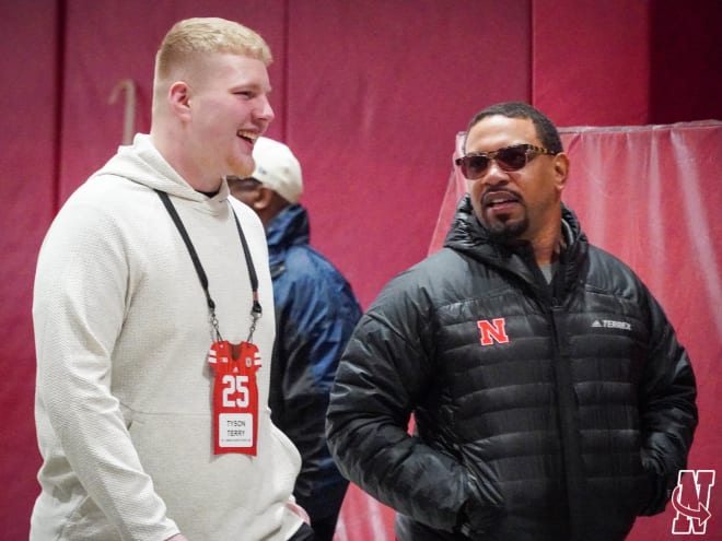 Tyson Terry, who committed to Nebraska over the weekend, alongside Husker director of player personnel Omar Hales.