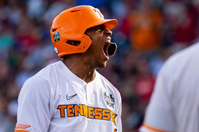 Jun 14, 2024; Omaha, NE, USA; Tennessee Volunteers second baseman Christian Moore (1) celebrates after hitting a RBI double against the Florida State Seminoles during the second inning at Charles Schwab Filed Omaha. 