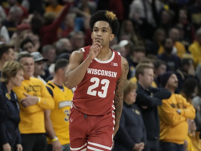 Wisconsin's Chucky Hepburn reacts after making a three-pointer, one of five he made in the Badgers' 80-77 victory over Marquette.