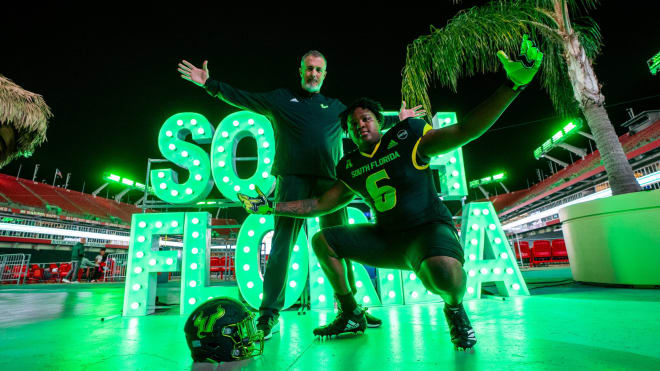 Smith poses with new DL coach Kevin Patrick during his OV to USF this past weekend