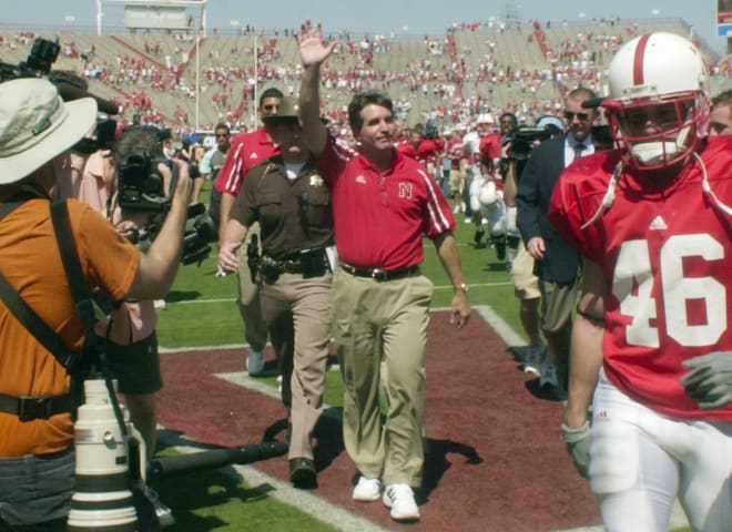 Bill Callahan walks off the field for the first time as a Husker head coach following the 2004 spring game. 