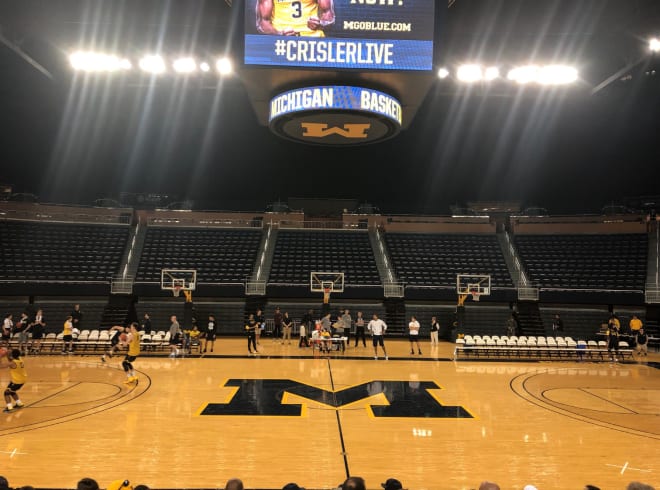 Michigan Wolverines basketball managers do it all for the team at practices and games. 