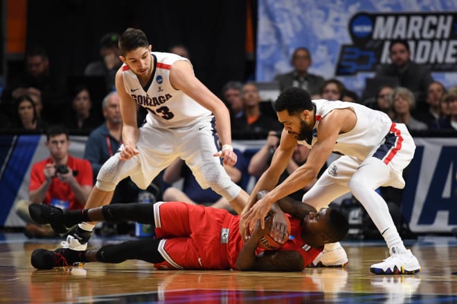 Guard Kam Williams battles for a ball in Ohio State's loss to Gonzaga in the Round of 32 in the NCAA Tournament. 