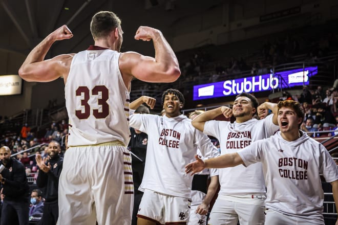 BC senior center James Karnik flexes at his bench during a 16-and-11 double-double against Florida State (Photo courtesy of BC Men's Basketball).