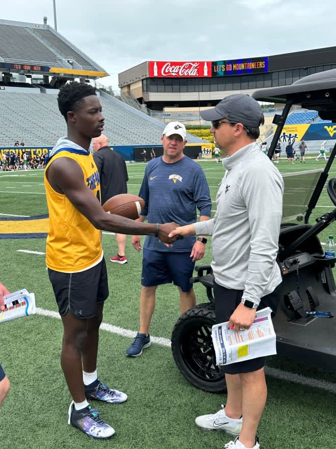 Wilkins impressed with his arm at the West Virginia Mountaineers football camp.
