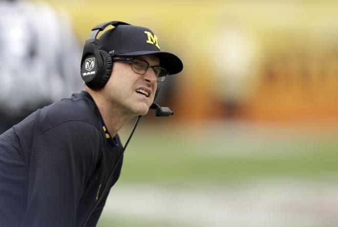 Michigan Wolverines football head coach Jim Harbaugh and his team play in 16 days at Minnesota.