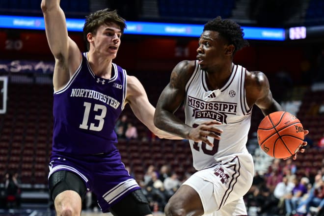 Brooks Barnhizer guards Josh Hubbard, who scored 29 points for Mississippi State.