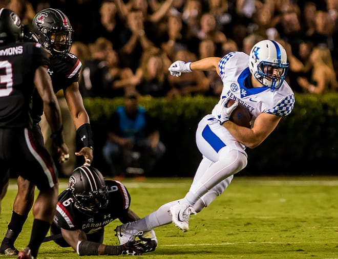 Kentucky tight end C.J. Conrad slipped away from a South Carolina tackle in the first half of Saturday's game at South Carolina. 