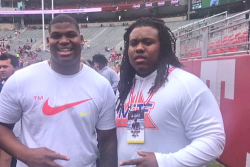 Tim Keenan (right) with former Alabama defensive lineman Quinnen Williams. 