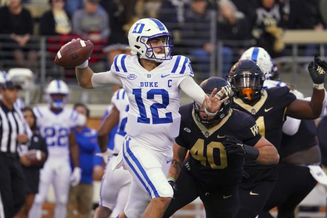 Gunnar Holmberg winds up to throw a pass against Wake Forest. 