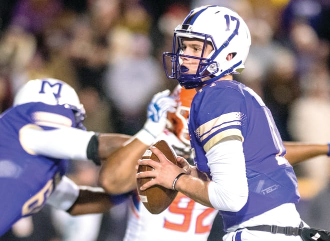 James Madison quarterback Bryan Schor looks to throw during the Dukes' FCS quarterfinal victory over Sam Houston State in December.