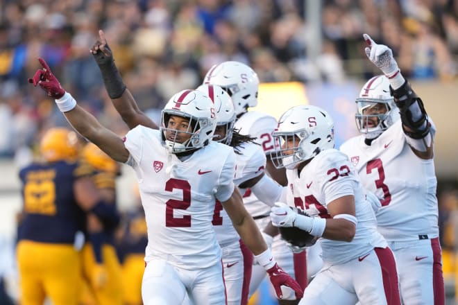 Alaka'i Gilman celebrates after an interception before being tackled well after the play was over. 