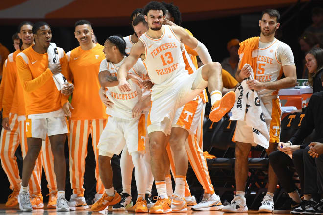 Tennessee forward Olivier Nkamhoua (13) reacts to Tennessee guard Isaiah Sulack s (31) three point shot during an NCAA college basketball game between the South Carolina Game Cocks and the Tennessee Volunteers in Thompson-Boling Arena in Knoxville, Saturday Feb. 25, 2023. Tennessee defeated South Carolina 85-45. 