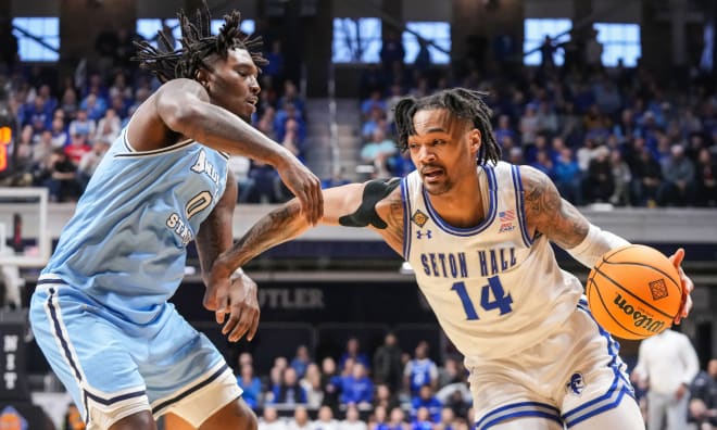 Seton Hall Pirates guard Dre Davis (14) rushes up the court against Indiana State Sycamores guard Xavier Bledson (0) on Thursday, April 4, 2024, during the NIT championship game at Hinkle Fieldhouse. Photo Credit: Grace Hollars/IndyStar / USA TODAY NETWORK