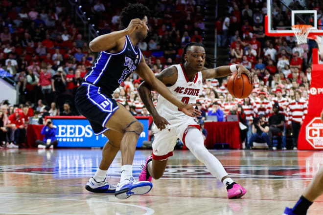 Sean Stewart, left, defends N.C. State's DJ Horne on Monday night. 