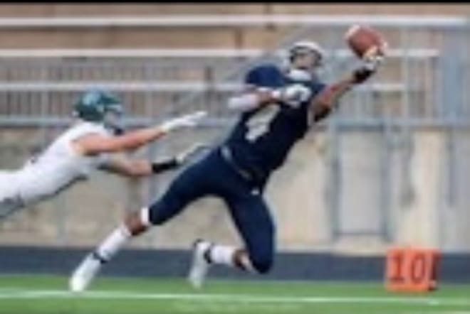 Miller stretches out for a one-handed diving catch in a high school game his senior season.