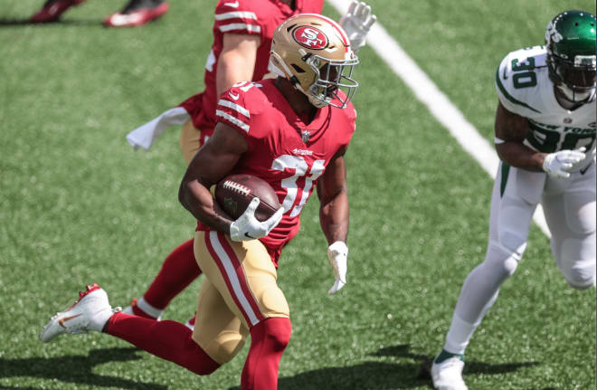 San Francisco 49ers running back Raheem Mostert (31) rushes for a touchdown during the first quarter against the New York Jetsat MetLife Stadium.