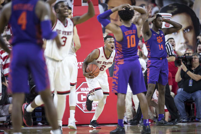 Torin Dorn (2) and the Wolfpack celebrate after Clemson senior guard Gabe DeVoe (10) missed a potential game-tying free throw with 0.2 seconds left.