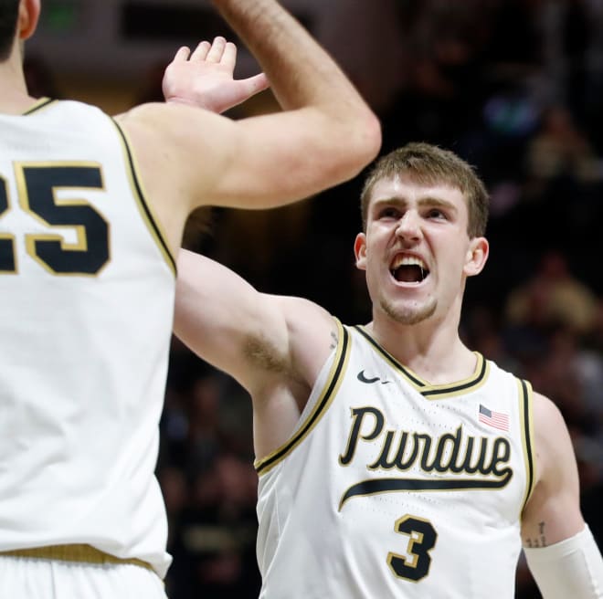 Purdue Boilermakers guard Ethan Morton (25) high-fives Purdue Boilermakers guard Braden Smith (3) during the NCAA s men s basketball game against the Ohio State Buckeyes, Sunday, Feb. 19, 2023, at Mackey Arena in West Lafayette, Ind. Purdue won 82-55.