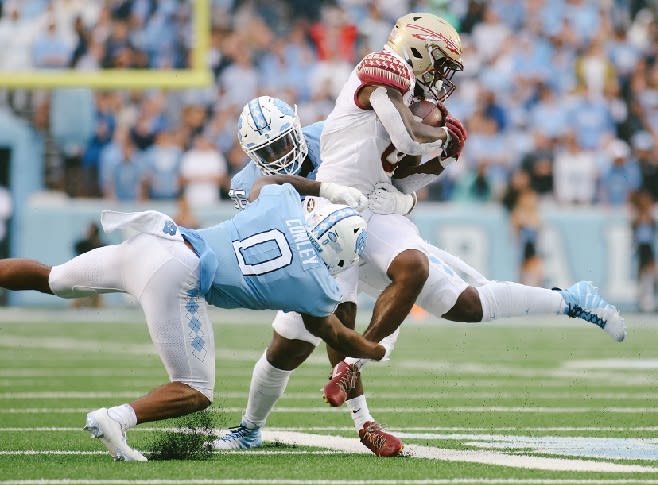 UNC defensive back Ja'Qurious Conley is back practicing after a serious knee injury, but there's no rushing him into games.