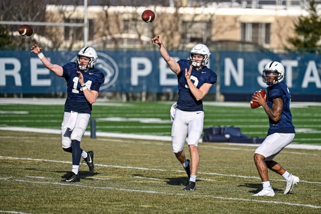 Penn State quarterbacks Sean Clifford, Christian Veilleux, and Ta'Quan Roberson throw passes during a Penn State spring practice. Penn State Athletics photo/Mark Selders