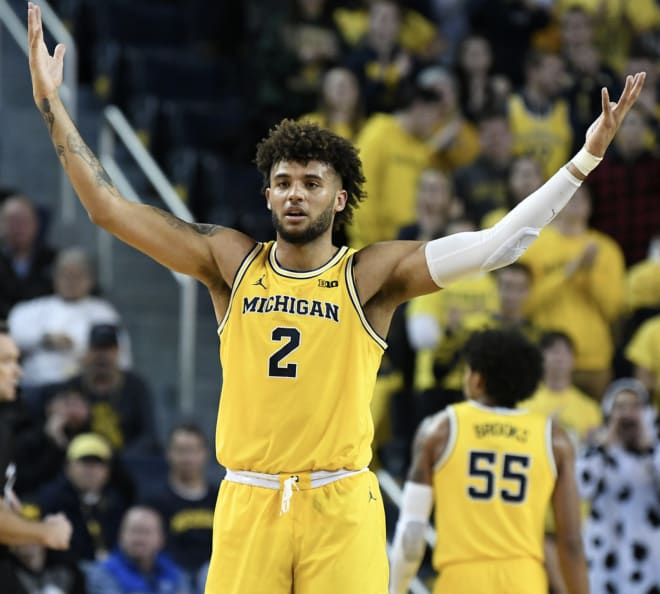 Michigan Wolverines basketball forward Isaiah Livers is still working out at U-M while debating his future.