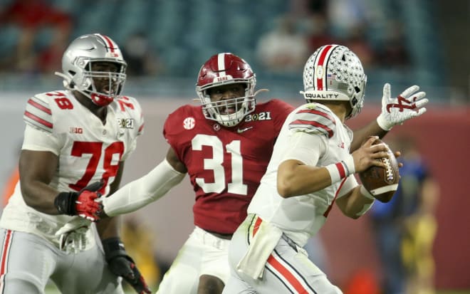 Alabama linebacker Will Anderson Jr. (31) pressures Ohio State quarterback Justin Fields (1) during the College Football Playoff National Championship Game in Hard Rock Stadium. Photo | Imagn