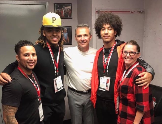 Tracy Ford (left), Gee Scott Jr. (center left), Ohio State head coach Urban Meyer (center) and Sam Adams II (center right) on an unofficial visit to Ohio State in October 2018. 