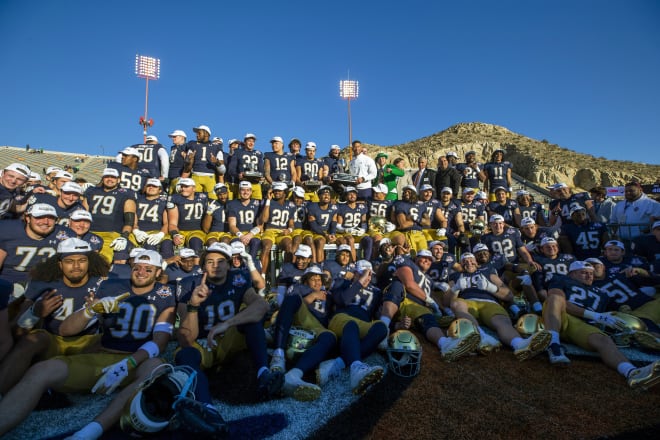 The Notre Dame football team celebrates its 40-8 Sun Bowl victory over Oregon State, Dec. 29 in El Paso, Texas. 
