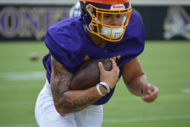 ECU running back Darius Pinnix and the Pirates went through a ninety play first fall scrimmage at Dowdy-Ficklen Stadium on Saturday.