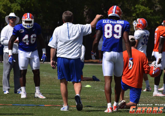 Florida head coach Jim McElwain greets sophomore wideout Tyrie Cleveland (89)