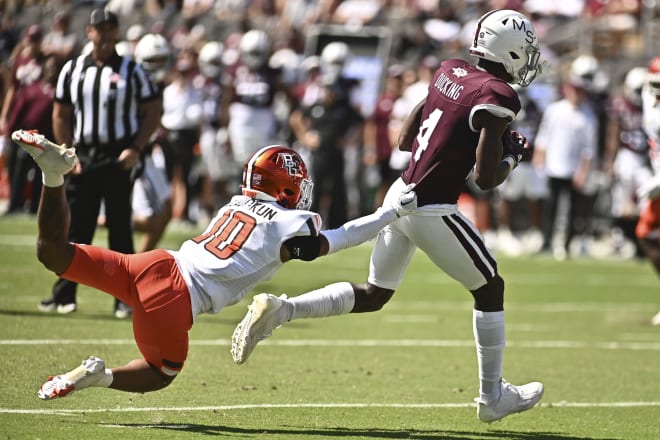 Sep 24, 2022; Starkville, Mississippi, USA; Mississippi State Bulldogs wide receiver Caleb Ducking (4) runs the ball while defended by Bowling Green Falcons cornerback Jordan Oladokun (10) during the second quarter at Davis Wade Stadium at Scott Field.