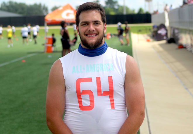 In-state offensive lineman Cole Dellinger holds a Michigan Wolverines football recruiting offer from Jim Harbaugh. 