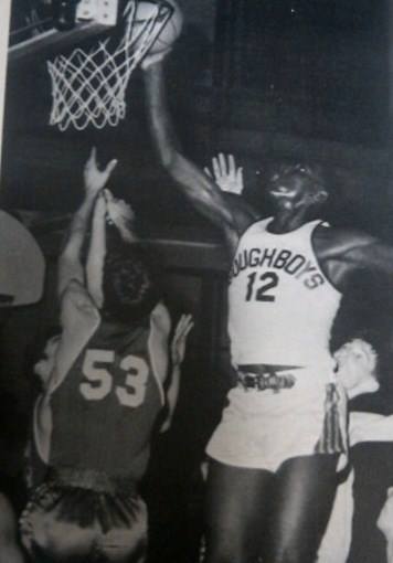 A young Spencer Haywood grabbing a rebound for Pershing.