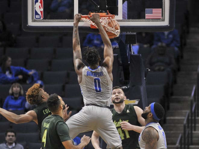 Memphis Tigers forward Kyvon Davenport (0) dunks against USF