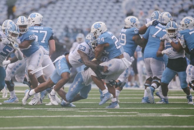 UNC finished its spring practices with a rain-soaked game Saturday afternoon at Kenan Stadium.