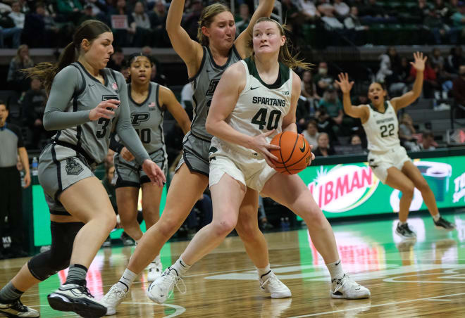 Michigan State's Julia Ayrault (40) looks to shoot against Purdue at the Breslin Center Wednesday, Jan. 24, 2024.