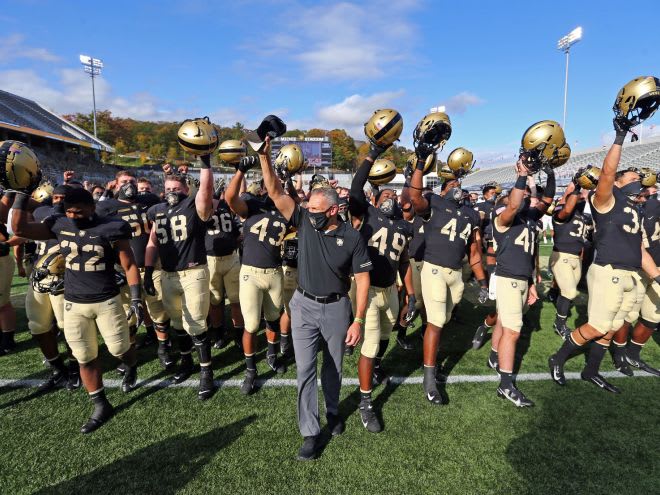 Army Head Coach Jeff Monken and the Black Knights celebrate their Saturday win over Mercer