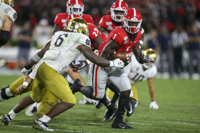 Former UGA cornerback Divaad Wilson comes down with the football against Notre Dame. 