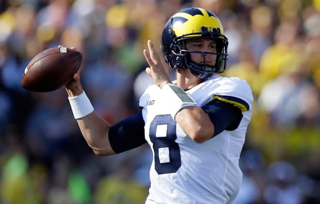 Fifth-year senior John O'Korn will lead the Wolverines against Michigan State Saturday night.